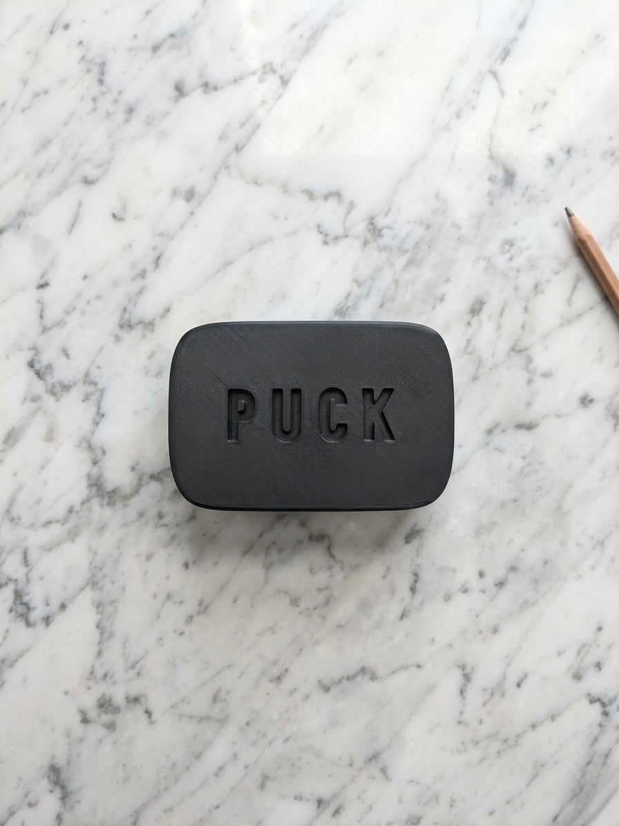 PUCK Alarm on marble